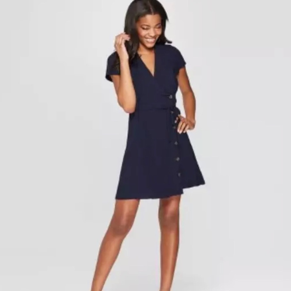 New small navy wrap button mini dress